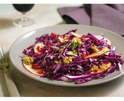 Purple cabbage, apple, pomegranate and walnuts salad