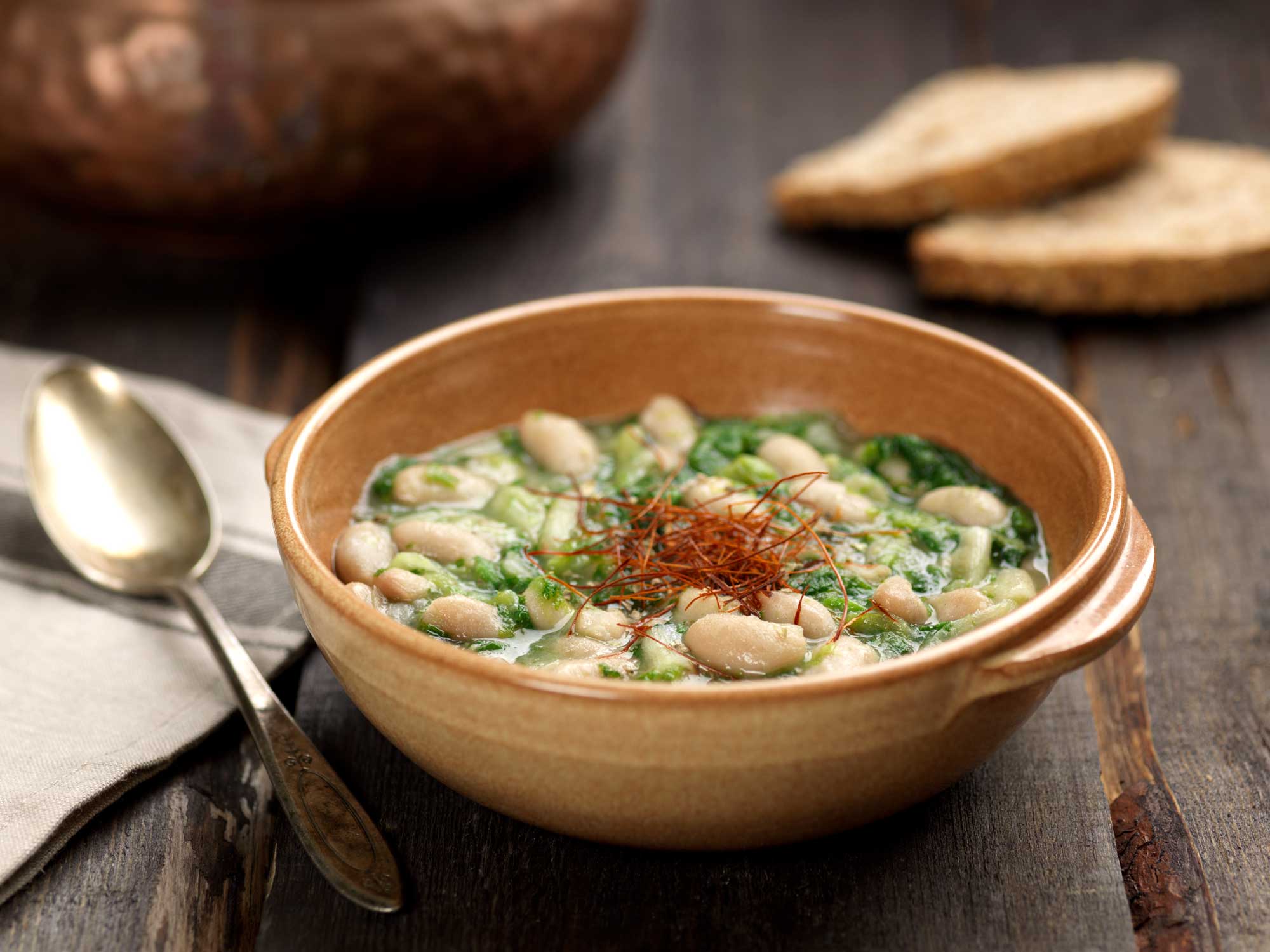 Spicy soup of escarole and cannellini beans